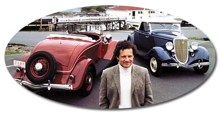 Andrew Timmis between two of his Timmis V-8 Roadsters.